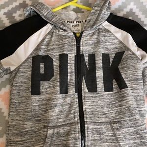 Grey sleeves with white and black on top